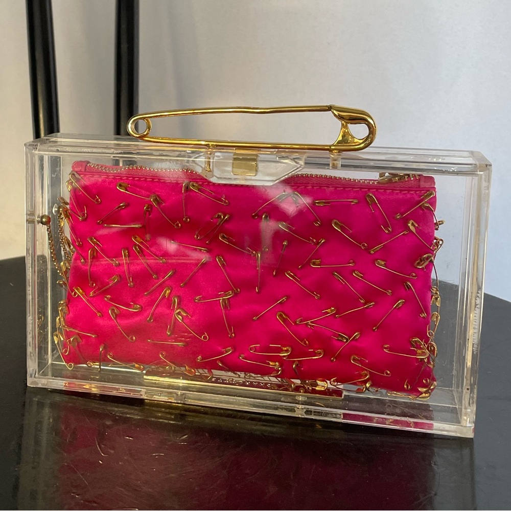 Charlotte Olympia pin clutch